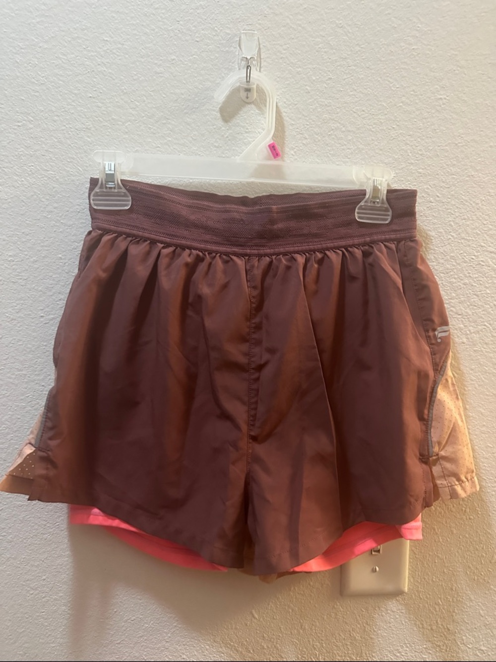 Pink Fabletics layered gym shorts with pocket